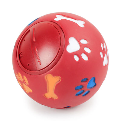 Red rubber pet toy with paw print and bone cutouts, featuring a rotating treat-dispensing mechanism. - Image 9