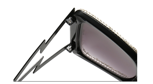 Women's oversized square sunglasses with cream frames, green rhinestones, brown gradient lenses, and lightning bolt temples. - Image 13