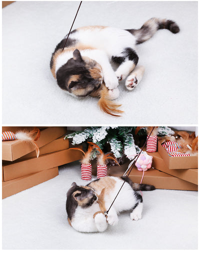 Cat wand toy with a wooden stick, a burlap heart, and brown feathers, designed for interactive play. - Image 10