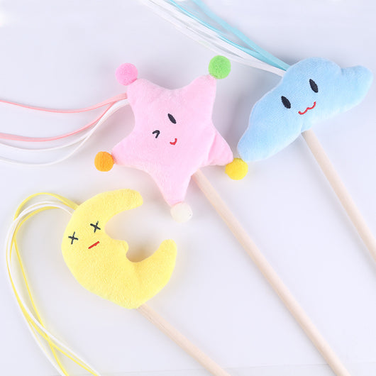 Cat wand toy with a wooden stick, a burlap heart, and brown feathers, designed for interactive play. - Image 9