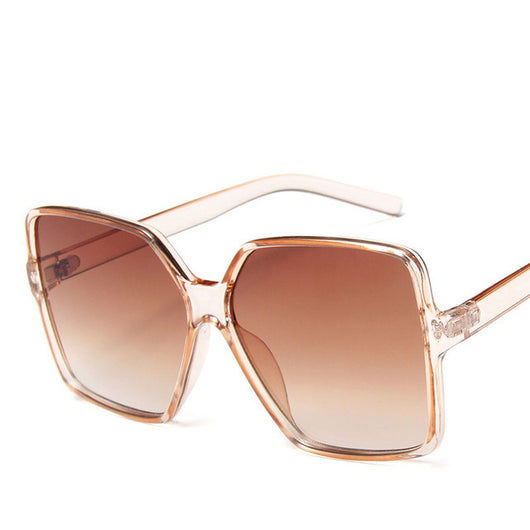 Trendy oversized sunglasses with black and tortoiseshell frames and gradient grey lenses, angled on a white background. - Image 3