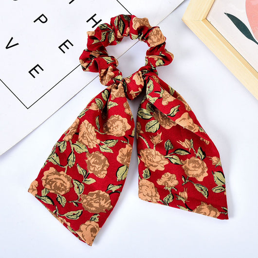 Moño Perla con Lazo Floral - Goma Elástica para Cabello Elegante - Image 3