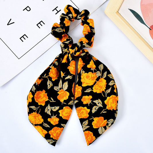 Moño Perla con Lazo Floral - Goma Elástica para Cabello Elegante