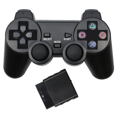 Orange transparent wireless game controller for PS2 with black buttons and a matching orange receiver. - Image 10