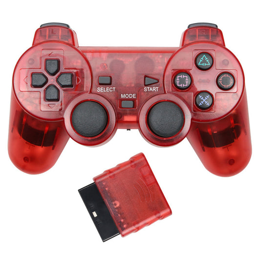 Orange transparent wireless game controller for PS2 with black buttons and a matching orange receiver. - Image 15