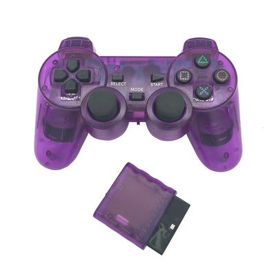 Orange transparent wireless game controller for PS2 with black buttons and a matching orange receiver.