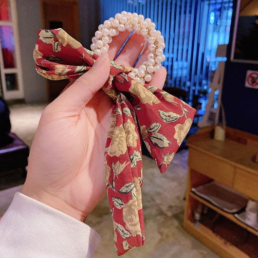 Moño Perla con Lazo Floral - Goma Elástica para Cabello Elegante - Image 4
