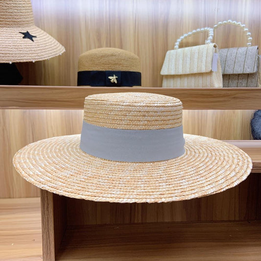 Sombrero de Paja Tipo Panamá con Ala Ancha y Nudo Decorativo Gris