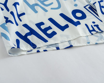 Playera Hombre Estampado Flores y Letras Callejeras Manga Corta - Image 5