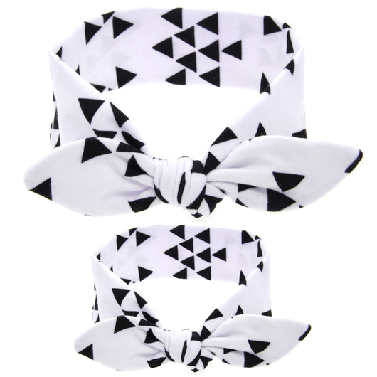 Two blue headbands with white polka dots and knotted bows, one adult-sized and one child-sized, for a matching set. - Image 20
