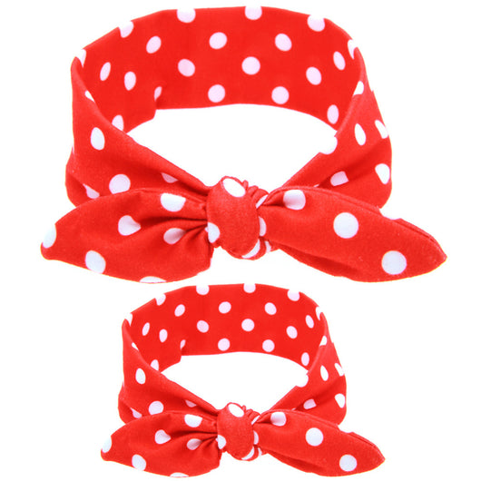 Two blue headbands with white polka dots and knotted bows, one adult-sized and one child-sized, for a matching set. - Image 24