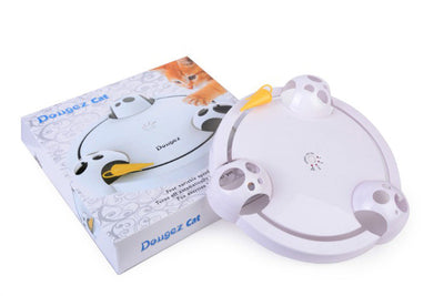 White interactive cat toy with a yellow feather, designed for mouse pouncing, next to a silver tabby cat. - Image 11