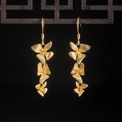 Aretes Largos de Borla Clásicos con Temperamento Literario