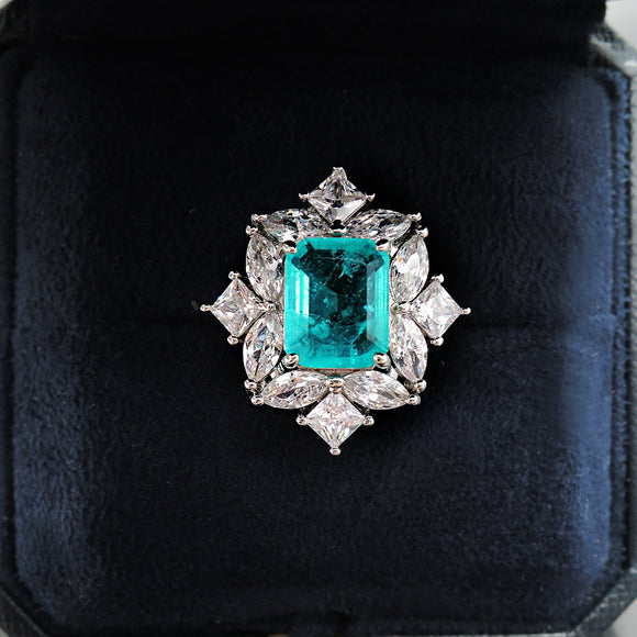 Anillo Paraíba y Esmeralda con Simulación de Diamantes