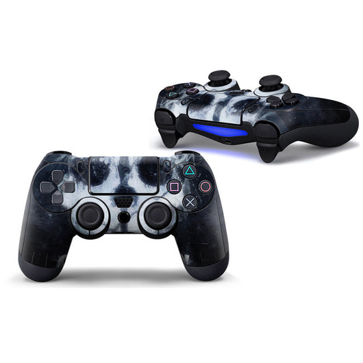 Two PS4 controllers with a black and white skull pattern PVC sticker, one facing front and one angled. - Image 6
