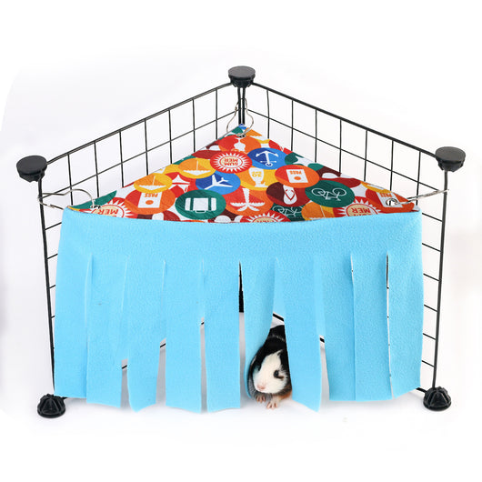 Blue and gray pet hammock with tassels hanging in a black wire cage, with a small hamster peeking out. - Image 12
