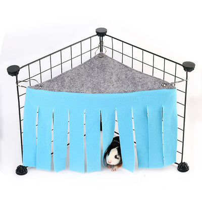 Blue and gray pet hammock with tassels hanging in a black wire cage, with a small hamster peeking out. - Image 5
