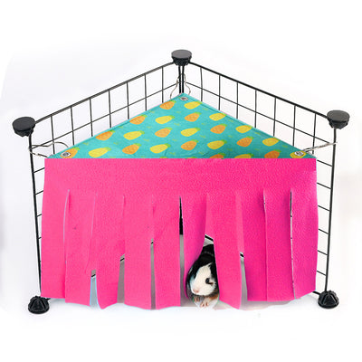 Blue and gray pet hammock with tassels hanging in a black wire cage, with a small hamster peeking out. - Image 3