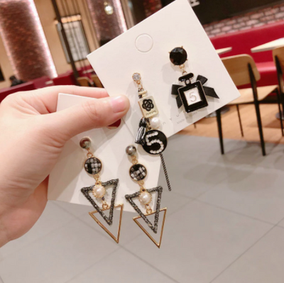 Aretes Circulares Dorados con Perla y Moño - Diseño Elegante y Trendy - Image 5