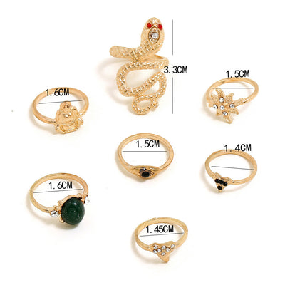 Juego de 7 Anillos Articulados con Diamantes y Serpiente Esmeralda - Image 9