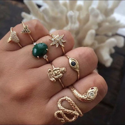 Juego de 7 Anillos Articulados con Diamantes y Serpiente Esmeralda