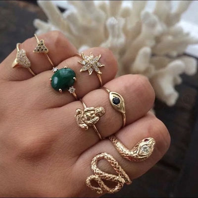 Juego de 7 Anillos Articulados con Diamantes y Serpiente Esmeralda
