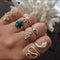 Juego de 7 Anillos Articulados con Diamantes y Serpiente Esmeralda