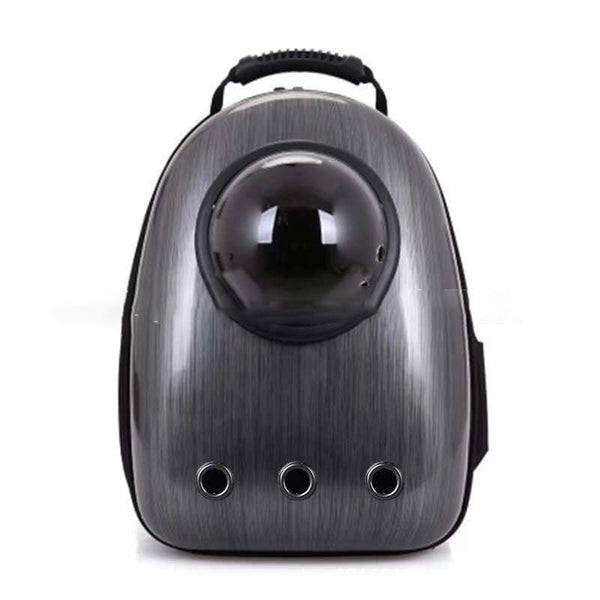 Black and white penguin-shaped pet carrier backpack with a transparent bubble window and ventilation holes.