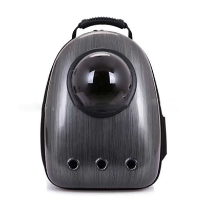 Black and white penguin-shaped pet carrier backpack with a transparent bubble window and ventilation holes.