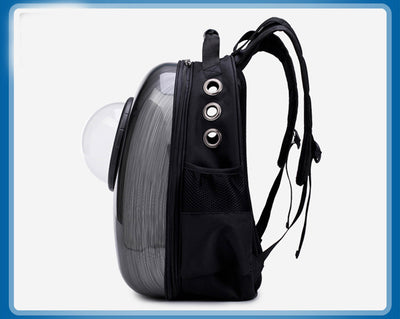 Black and white penguin-shaped pet carrier backpack with a transparent bubble window and ventilation holes. - Image 24