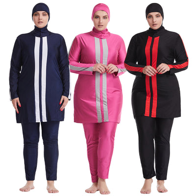 Plus size women's navy blue conservative swimsuit with white vertical stripes on the tunic and white sleeve stripes. - Image 17