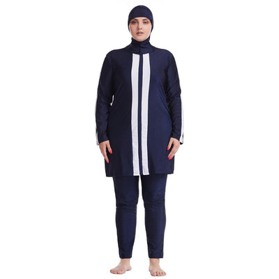 Plus size women's navy blue conservative swimsuit with white vertical stripes on the tunic and white sleeve stripes. - Image 11