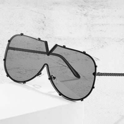V-shaped one-piece lens frog sunglasses with a gold frame and gradient purple to pink lenses. - Image 15