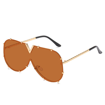 V-shaped one-piece lens frog sunglasses with a gold frame and gradient purple to pink lenses. - Image 3