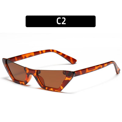 Retro cat-eye sunglasses with a brown leopard print plastic frame and brown lenses, shown on a white background. - Image 3