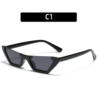 Retro cat-eye sunglasses with a brown leopard print plastic frame and brown lenses, shown on a white background. - Image 2