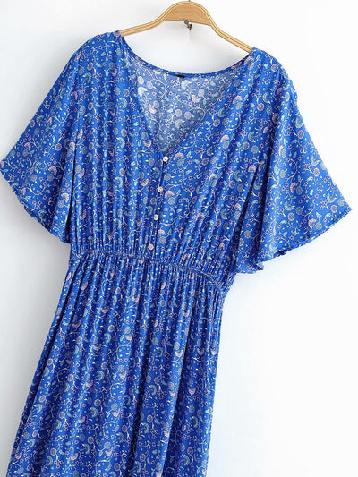 Vestido Playero Vintage Chic con Estampado Floral y Mangas Murciélago - Image 11