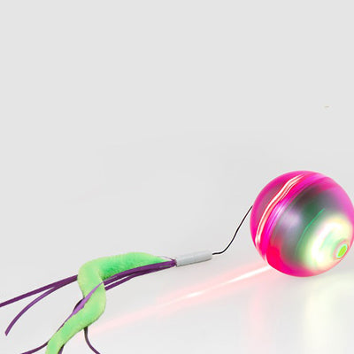 Electric cat toy with a glowing purple and green ball, attached to a fuzzy green tail with purple ribbons. - Image 4