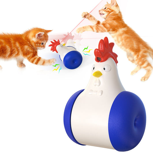 White and yellow chicken-shaped tumbler cat toy with a laser pointer, being played with by two orange tabby cats. - Image 12