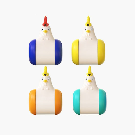 White and yellow chicken-shaped tumbler cat toy with a laser pointer, being played with by two orange tabby cats. - Image 3