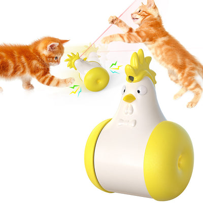 White and yellow chicken-shaped tumbler cat toy with a laser pointer, being played with by two orange tabby cats. - Image 6