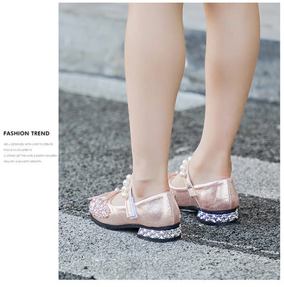 Silver glitter princess shoes for girls with rhinestone and pearl embellishments, a pearl-decorated strap, and a small heel. - Image 8
