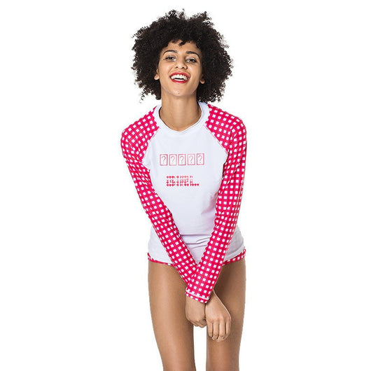 Woman wearing a red and white gingham long-sleeve rash guard top with matching bikini bottoms. - Image 4