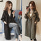 Abrigo Trench Coat de Corte Holgado con Detalles de Herraje