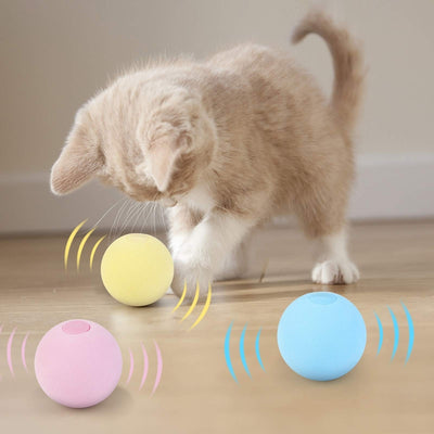 Light yellow interactive cat toy ball with a cricket sound feature, shown next to its yellow packaging. - Image 11