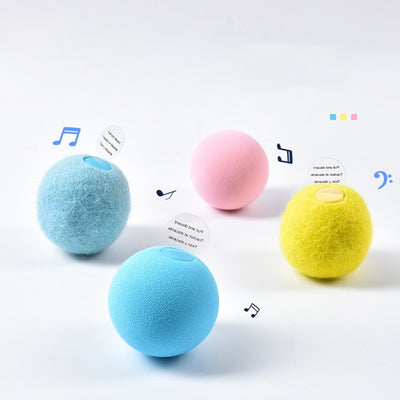 Light yellow interactive cat toy ball with a cricket sound feature, shown next to its yellow packaging. - Image 12