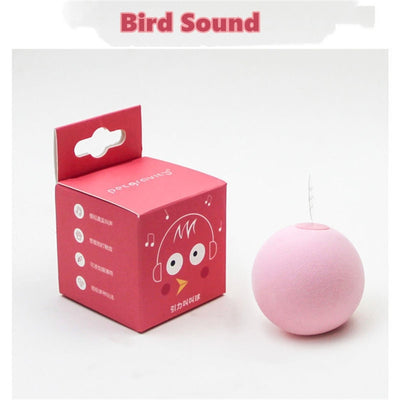 Light yellow interactive cat toy ball with a cricket sound feature, shown next to its yellow packaging. - Image 15