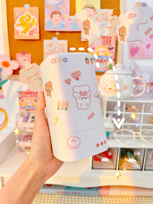 White desktop humidifier with a soft glow, decorated with cute cartoon animal and fruit stickers, shown with a USB cable and a sheet of additional stickers. - Image 11
