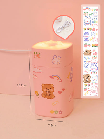 White desktop humidifier with a soft glow, decorated with cute cartoon animal and fruit stickers, shown with a USB cable and a sheet of additional stickers. - Image 5