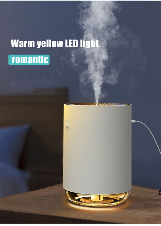 White cylindrical USB humidifier with a power button and a clear base, suitable for car or desktop use. - Image 8